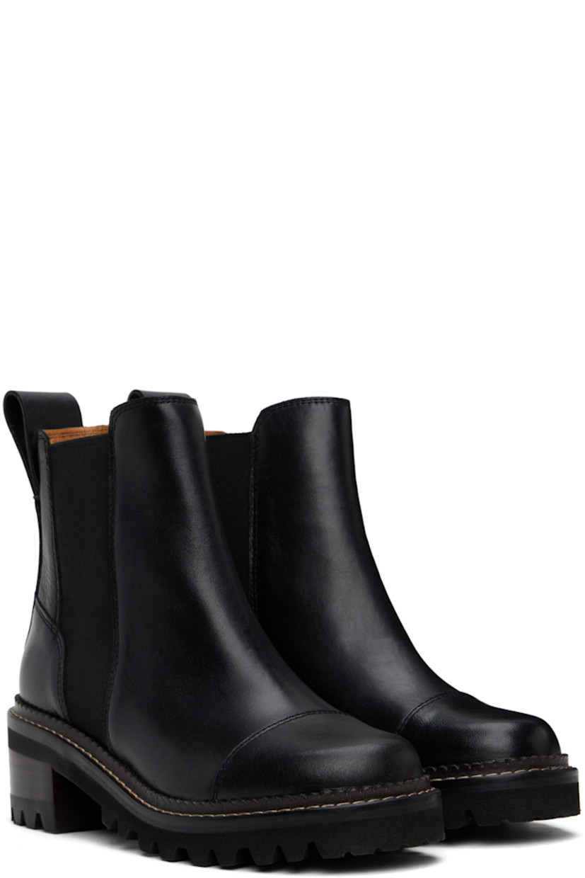 Ankle-high grained leather boots in black. 

· Cap toe
· Elasticized gusset at sides
· Pull-loop at heel tab
· Logo embossed at heel counter
· Stacked leather block heel
· Scalloped detailing and topstitching at welt
· Treaded rubber sole 
· Heel: H2"

Supplier color: Black