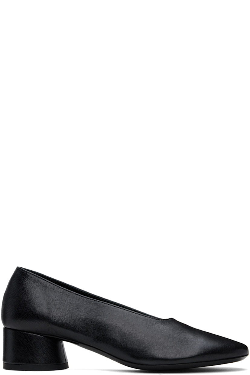 Nappa lambskin heels in black.

· Grained leather and suede lining
· Logo embossed at padded leather footbed
· Covered cylindrical block heel with rubber injection
· Polished leather sole
· Heel: H1.75"

Supplier color: Black