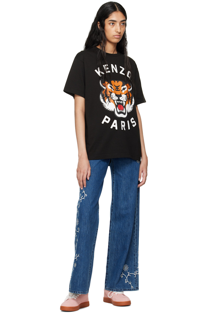 Wide-leg non-stretch Japanese denim jeans. Fading and floral pattern embroidered throughout.

· High rise 
· Belt loops
· Five-pocket styling
· Zip-fly 
· Jacron logo patch at back waistband 
· Silver-tone logo-engraved hardware