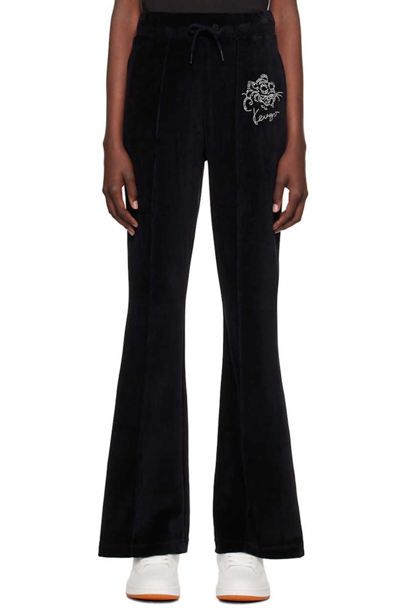 Cotton-blend velour track pants.

· Drawstring at elasticized waistband
· Two-pocket styling
· Logo graphic embroidered at front
· Pinched seam at front and back

Supplier color: Black