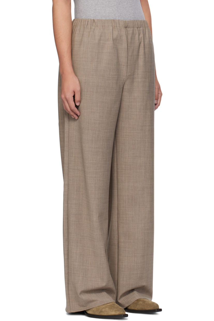 Stretch wool- and recycled polyester-blend canvas trousers.

· Elasticized waistband
· Two-pocket styling
· Mock-fly

Supplier color: Beige
