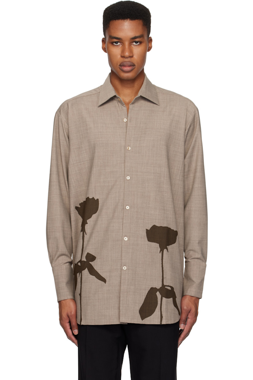 Plain-woven stretch wool- and recycled polyester-blend shirt.

· Spread collar
· Button closure
· Graphic appliqués at front
· Shirttail hem
· Pleated single-button barrel cuffs
· Twin pleats at back yoke

Supplier color: Beige