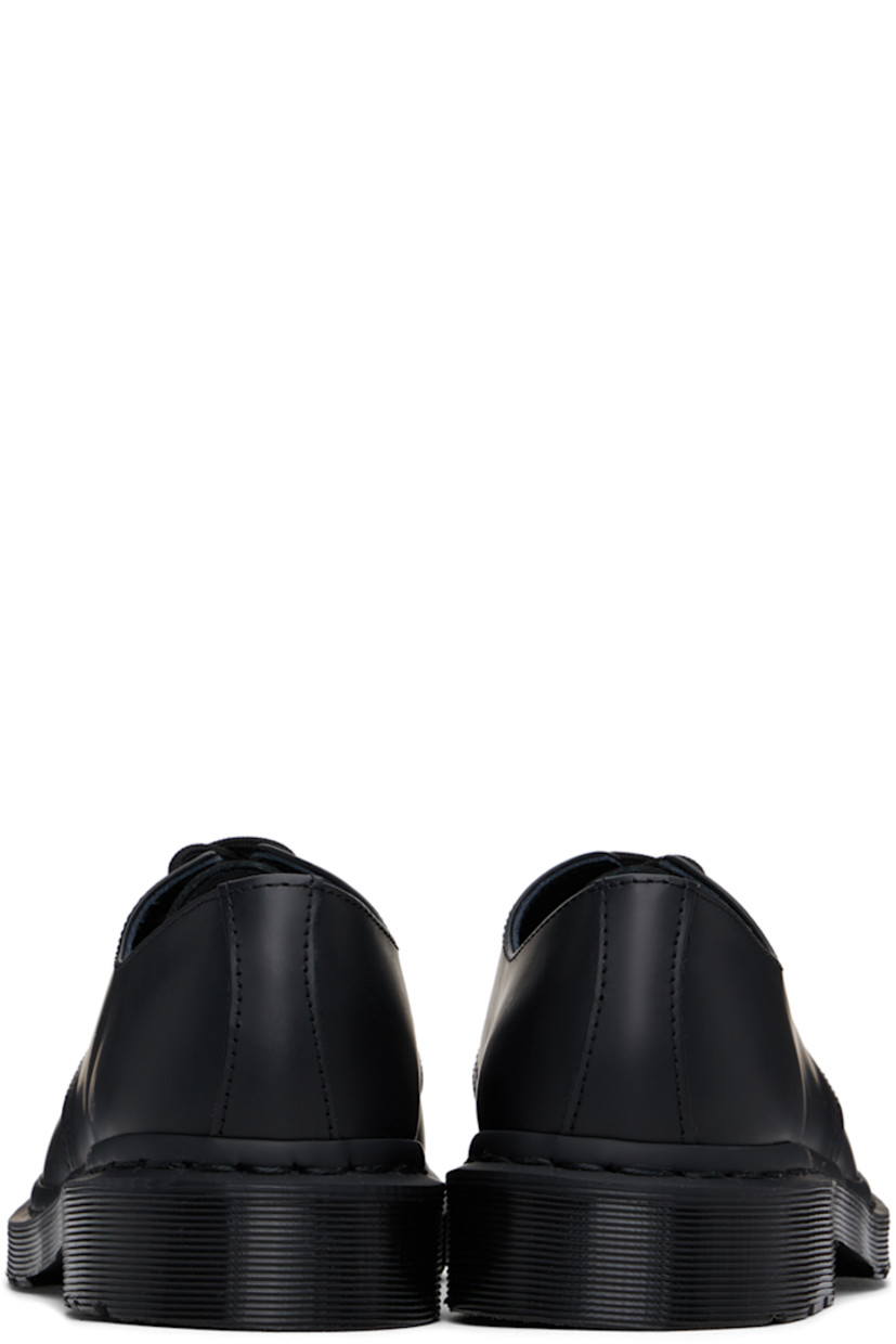 Polished leather derbys in black.

· Lace-up closure
· Buffed leather lining
· Heat-sealed Goodyear welt
· Treaded Air Cushion rubber sole

Supplier color: Black smooth