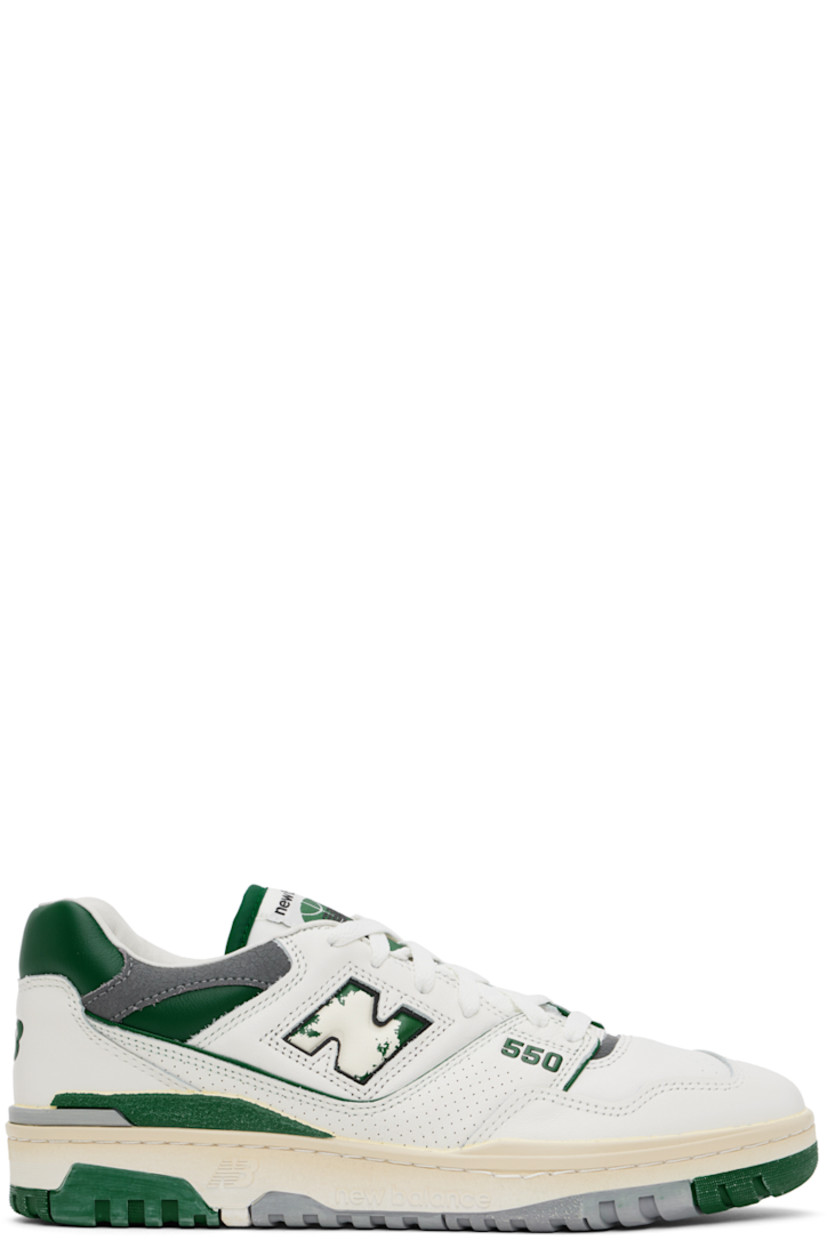 Low-top buffed leather sneakers in off-white, green, and gray.

· Perforated detailing at toe and sides
· Lace-up closure
· Logo patch at padded tongue
· Padded collar
· Distressed inset logo at sides
· Logo bonded at heel counter
· Grained leather and mesh lining
· Logo embossed at textured rubber midsole
· Treaded rubber sole

Supplier color: Sea salt/Marsh green/Shadow grey