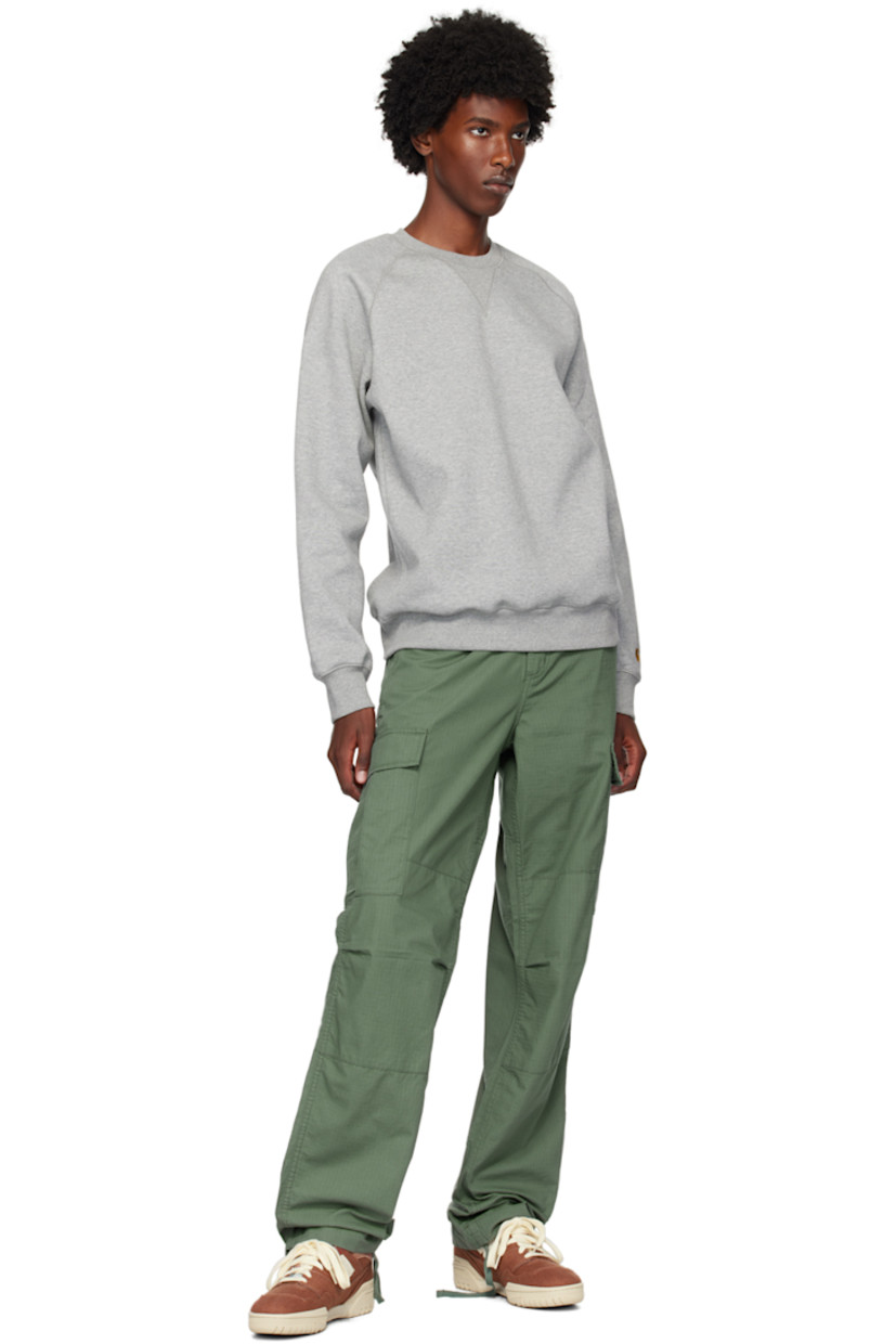 Low-top tweed sneakers in brown.

· Faux-suede trim throughout
· Lace-up closure
· Graphic patch and raw edge at padded tongue
· Padded collar
· Logo appliqué at sides
· Logo embroidered at outer side and heel counter
· Brushed jersey lining
· Logo-embossed textured rubber midsole
· Treaded rubber sole

Supplier color: Pecan/Crimson