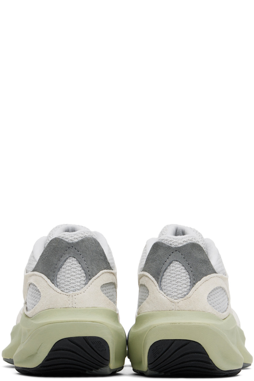 Low-top knit and pigskin suede sneakers in beige and gray.

· Lace-up closure
· Padded tongue and collar
· Logo bonded at sides
· Fleece lining
· Sculptural FuelCell foam rubber platform midsole
· Treaded rubber sole
· Platform: H2"

Supplier color: Linen/Brighton grey/Olivine