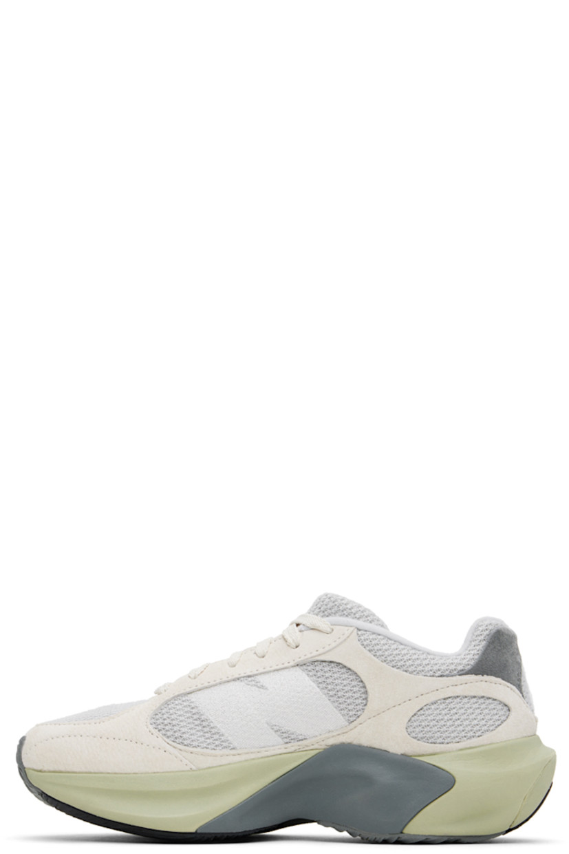 Low-top knit and pigskin suede sneakers in beige and gray.

· Lace-up closure
· Padded tongue and collar
· Logo bonded at sides
· Fleece lining
· Sculptural FuelCell foam rubber platform midsole
· Treaded rubber sole
· Platform: H2"

Supplier color: Linen/Brighton grey/Olivine