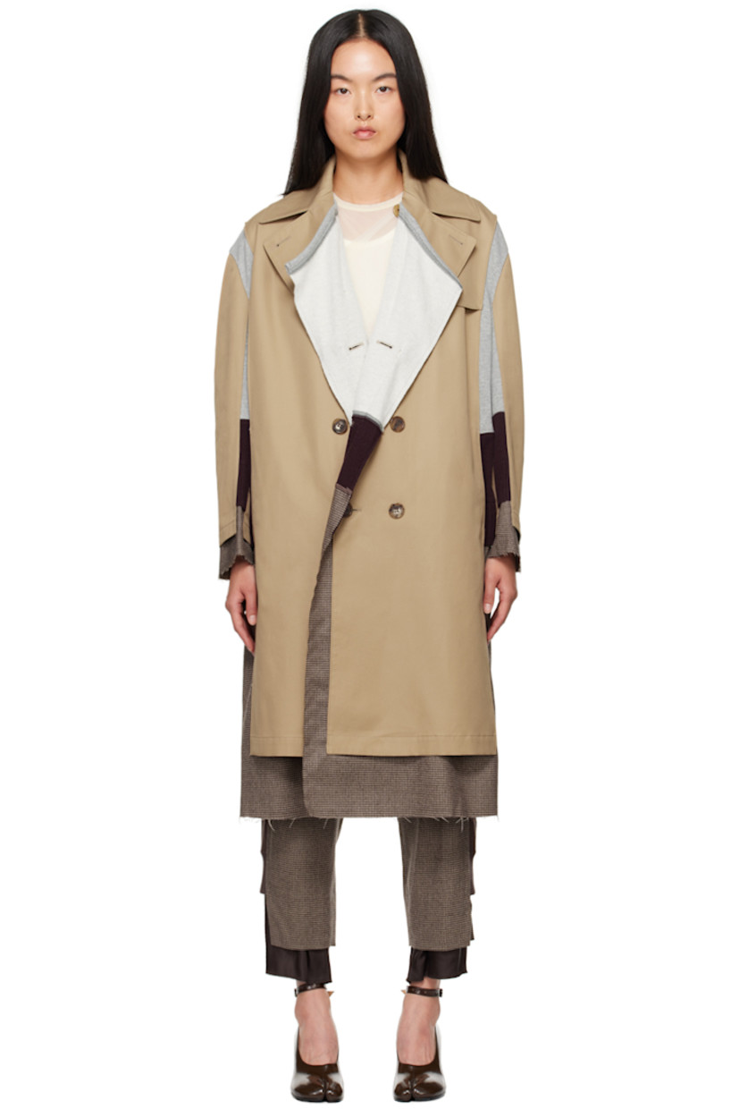 Cotton gabardine trench coat. Cotton terry cloth, knit wool, and houndstooth panels throughout.

· Paneled construction
· Notched lapel
· Double-breasted button closure
· Seam pockets
· Raw edge at hem and cuffs
· Central vent at back hem

Supplier color: Beige