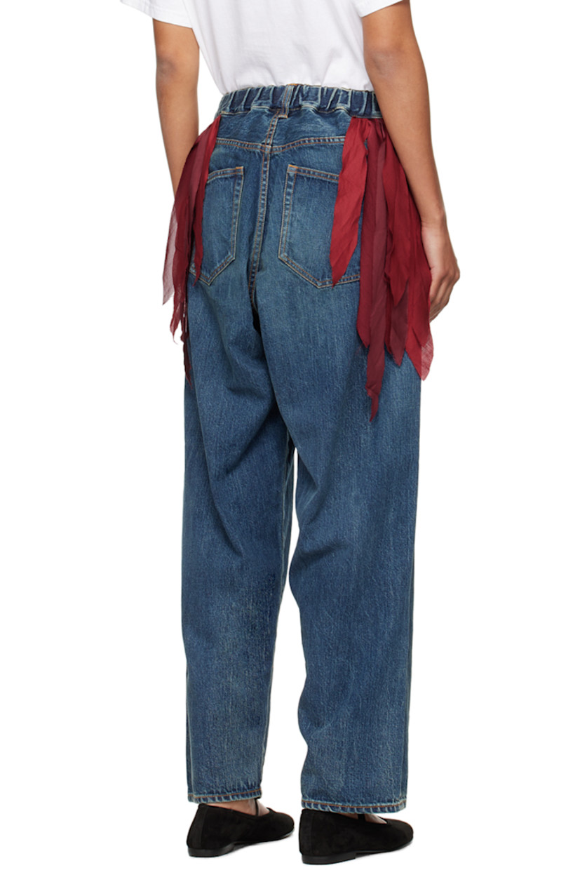 Non-stretch denim jeans. Fading, whiskering and subtle distressing throughout. 

· Belt loops at partially elasticized waistband
· Fringed trim at waist
· Five-pocket styling 
· Zip-fly
· Logo flag at back pocket
· Contrast stitching in tan 

Supplier color: Light blue indigo
