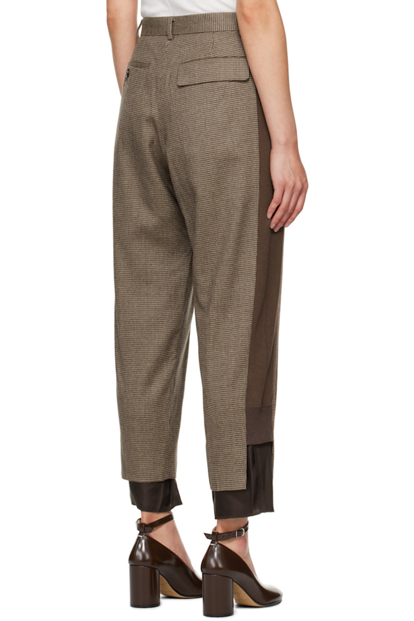 Wool-blend twill trousers. Houndstooth pattern throughout. 

· Paneled construction
· Belt loops
· Four-pocket styling
· Zip-fly
· Pleats at front
· Exposed lining at cuffs
· Rib knit panel at outseams
· Full satin lining

Supplier color: Brown