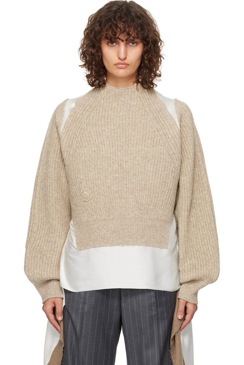 Rib-knit wool, sheer polyester georgette, and polyester satin sweater. Raw edges and subtle distressing throughout. 

· Paneled construction
· Mock neck
· Extended trim at side seams
· Raglan sleeves 

Supplier color: Gray beige