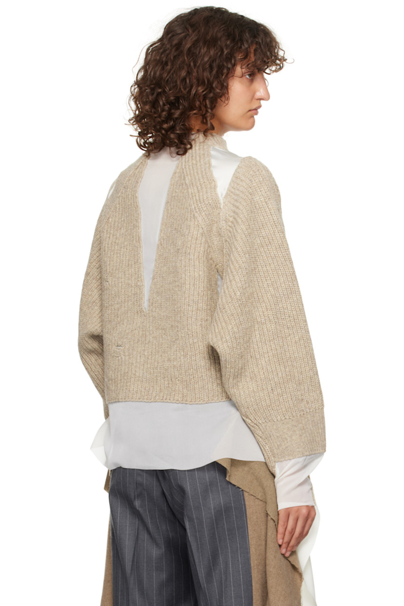 Rib-knit wool, sheer polyester georgette, and polyester satin sweater. Raw edges and subtle distressing throughout. 

· Paneled construction
· Mock neck
· Extended trim at side seams
· Raglan sleeves 

Supplier color: Gray beige