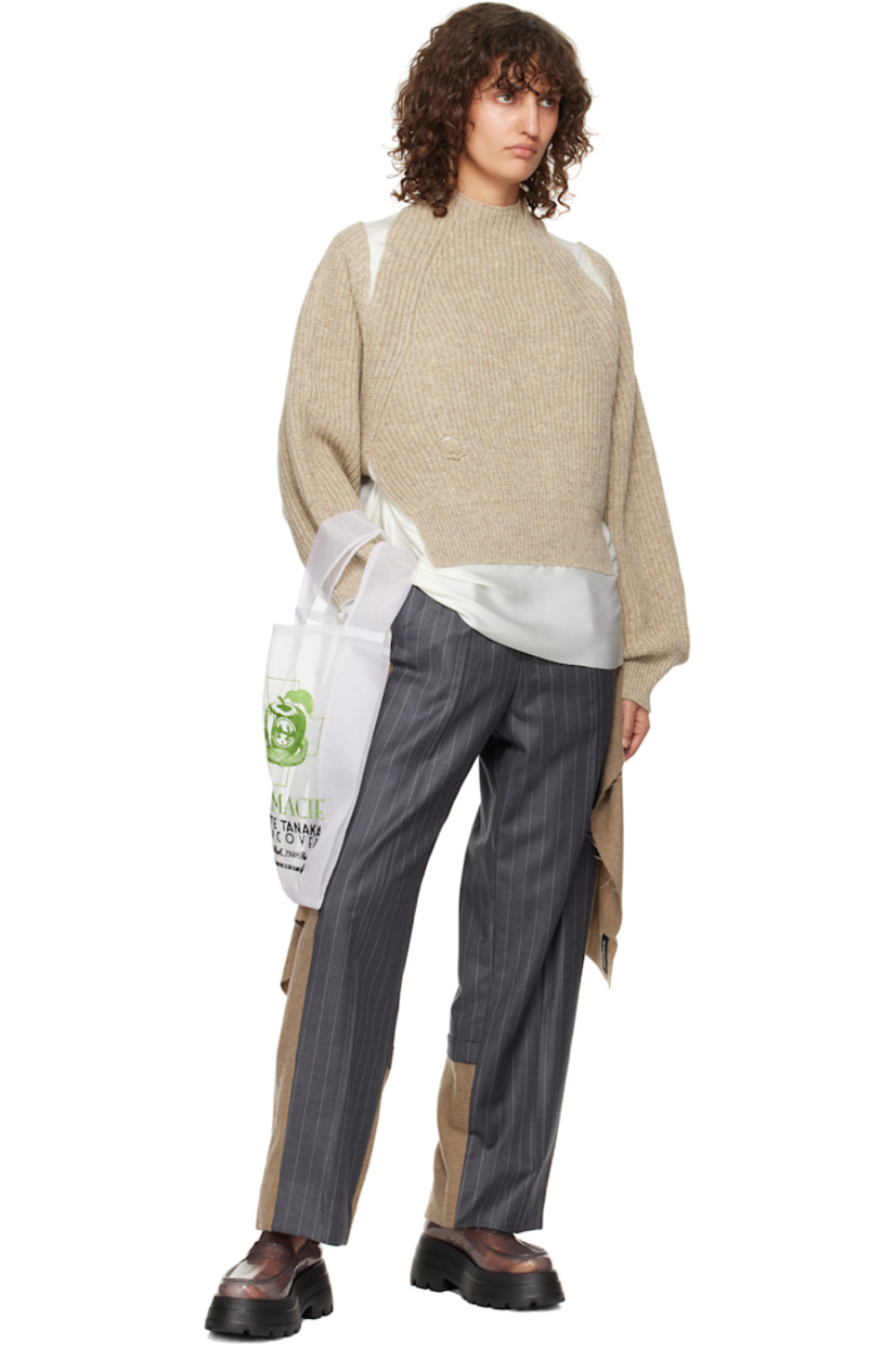Rib-knit wool, sheer polyester georgette, and polyester satin sweater. Raw edges and subtle distressing throughout. 

· Paneled construction
· Mock neck
· Extended trim at side seams
· Raglan sleeves 

Supplier color: Gray beige