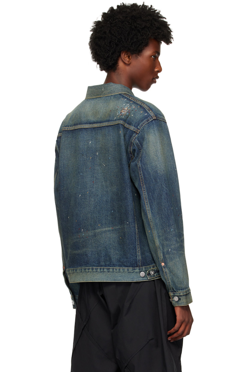 Non-stretch denim jacket. Fading, whiskering, and graphics embroidered throughout.

· Spread collar
· Button closure 
· Logo flag at chest
· Patch pocket and zip pockets
· Dropped shoulders
· Adjustable single-button barrel cuffs
· Adjustable button tabs at back hem
· Logo-engraved silver-tone hardware
· Contrast stitching in yellow

Supplier color: Light blue indigo