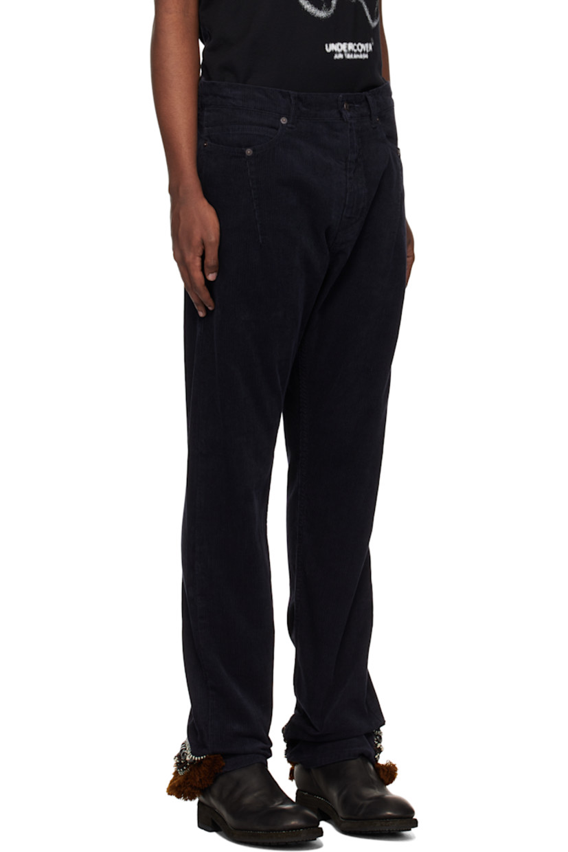 Cotton corduroy trousers. 

· Belt loops
· Five-pocket styling
· Zip fly
· Pintuck at front pockets
· Logo patch at back waistband
· Logo patch at back pocket
· Beaded and fringed trim at back cuffs

Supplier color: Navy