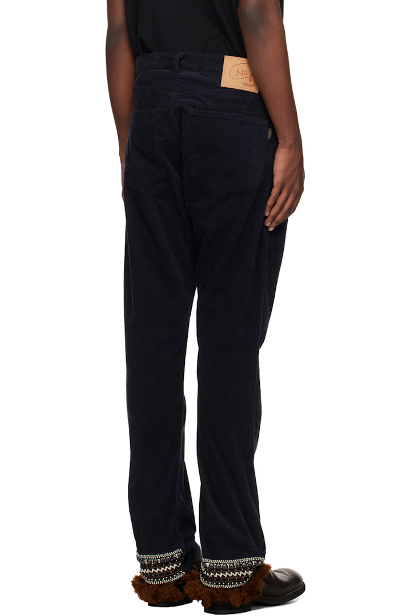 Cotton corduroy trousers. 

· Belt loops
· Five-pocket styling
· Zip fly
· Pintuck at front pockets
· Logo patch at back waistband
· Logo patch at back pocket
· Beaded and fringed trim at back cuffs

Supplier color: Navy