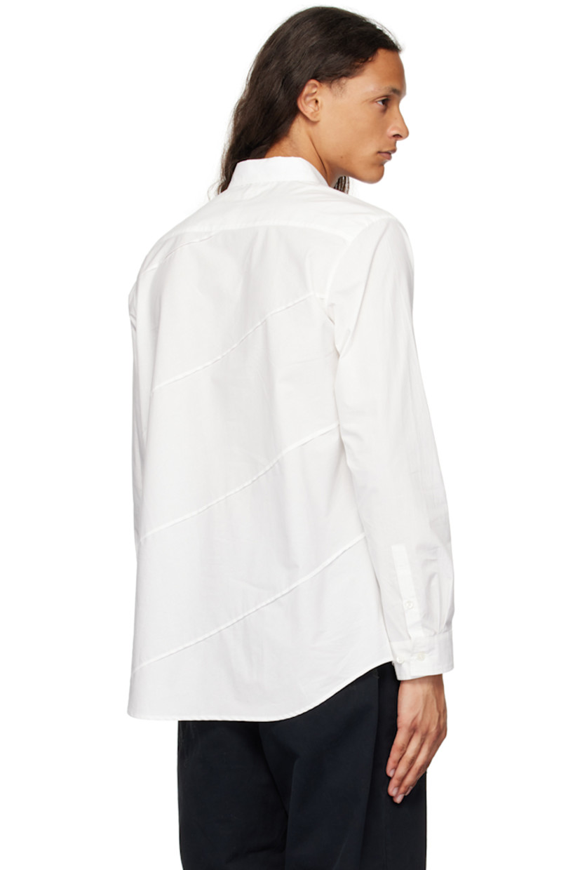 Cotton oxford cloth shirt. Raw edges throughout.

· Paneled construction
· Spread collar
· Button closure
· Logo patch at chest
· Shirttail hem
· Single-button barrel cuffs

Supplier color: White