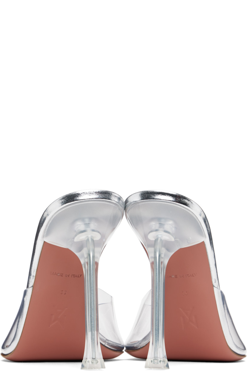 Transparent PVC heeled sandals. 

· Open pointed square toe 
· Logo-embossed grained goatskin footbed
· Transparent PVC kitten heel
· Leather sole with rubber injection
· Heel: H2.25"

Supplier color: Transparent