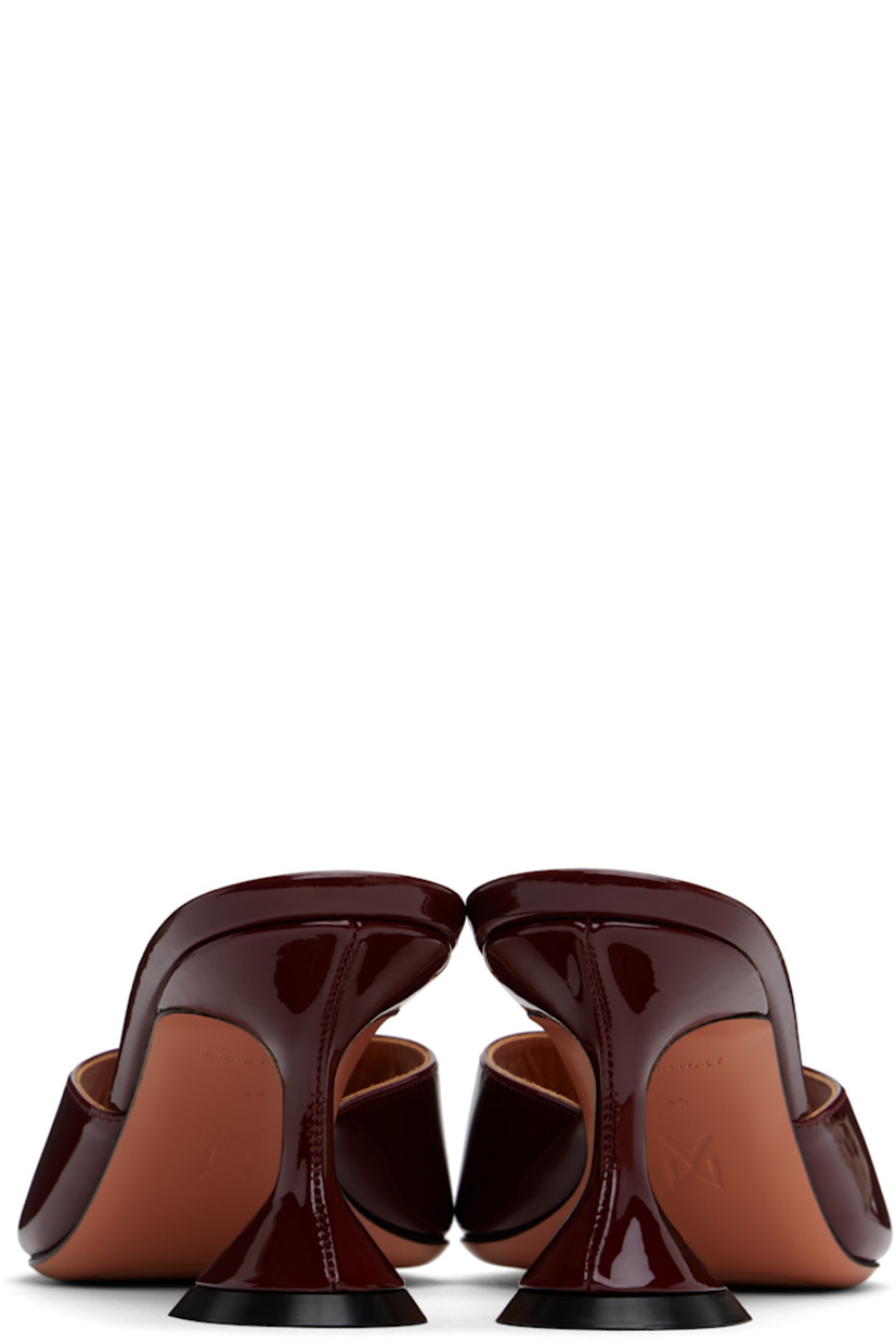 Patent leather heeled sandals in burgundy.

· Open square toe
· Logo embossed at padded leather footbed
· Covered spool heel with rubber injection
· Leather sole with rubber injection
· Heel: H2.75"

Supplier color: Wine