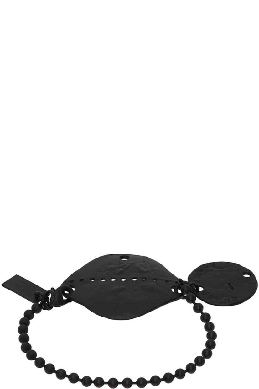 Brass ball chain bracelet in black. 

· Textured text-engraved graphic charms
· Logo plaque at lobster-clasp fastening

Supplier color: Black