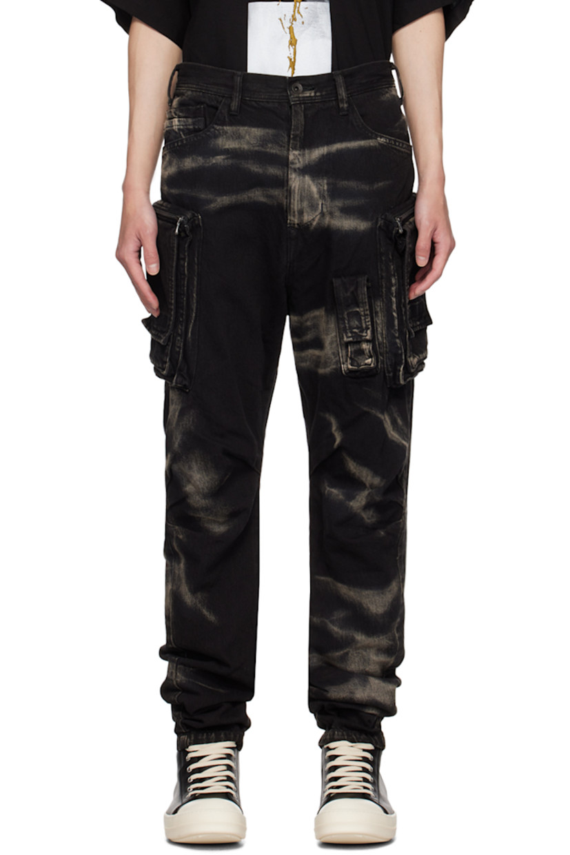 10 oz non-stretch denim cargo pants. Bleached effect throughout.

· Belt loops
· Seven-pocket styling
· Zip-fly
· Flap pocket at front
· Pleats at knees
· Zip cargo pocket at curved outseams

Supplier color: Black