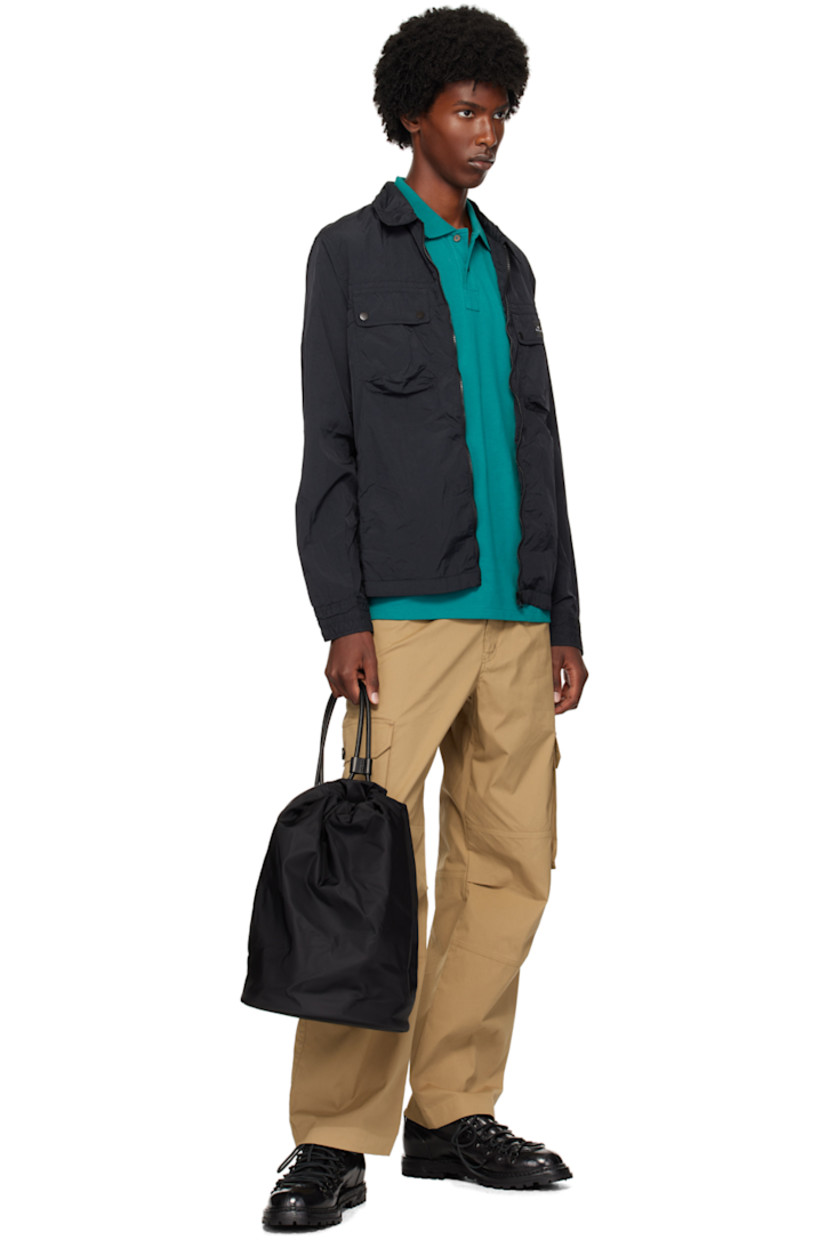 Recycled nylon taffeta jacket.

· Stand collar
· Zip closure 
· Flap and welt pockets at front
· Logo patch embroidered at chest 
· Press stud closure at barrel cuffs

Supplier color: Blacks