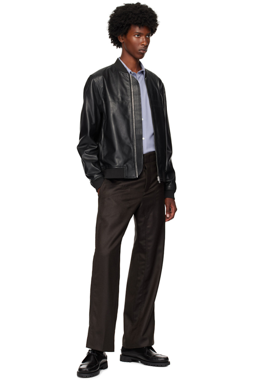 Grained lambskin bomber jacket. 

· Rib knit stand collar, hem, and cuffs
· Zip closure
· Zip pockets
· Welt pockets at interior
· Full viscose twill lining
· Logo-engraved silver-tone hardware

Supplier color: Blacks