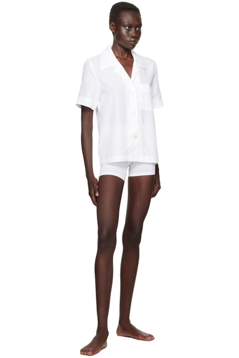 Breathable Tencel™ lyocell poplin pyjama shirt.

· Open spread collar
· Button closure
· Patch pocket at chest
· Mother-of-pearl hardware

Supplier color: White