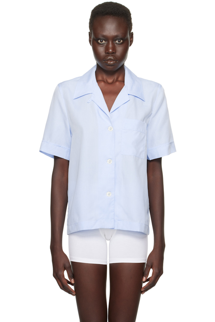 Breathable Tencel™ lyocell poplin pyjama shirt.

· Open spread collar
· Button closure
· Patch pocket at chest
· Mother-of-pearl hardware

Supplier color: Sky blue