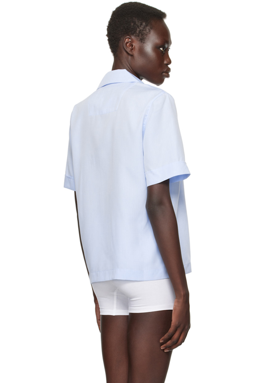 Breathable Tencel™ lyocell poplin pyjama shirt.

· Open spread collar
· Button closure
· Patch pocket at chest
· Mother-of-pearl hardware

Supplier color: Sky blue