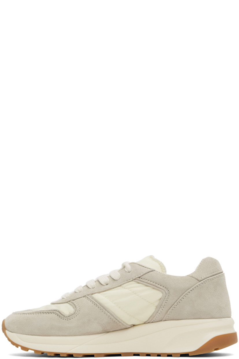 Low-top suede and quilted taffeta sneakers in off-white.

· Lace-up closure
· Padded tongue and collar
· Signature series stamp at outer side
· Grained leather and suede lining
· Sculptural foam rubber midsole
· Treaded rubber sole

Supplier color: Off white