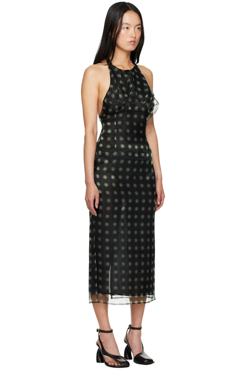 Semi-sheer polyester organza midi dress. Polka dot pattern printed throughout. 

· Round neck
· Gathering at chest
· Button fastening at halter strap
· Zip closure at open back
· Central vent at back hem
· Full georgette lining

Supplier color: Verde