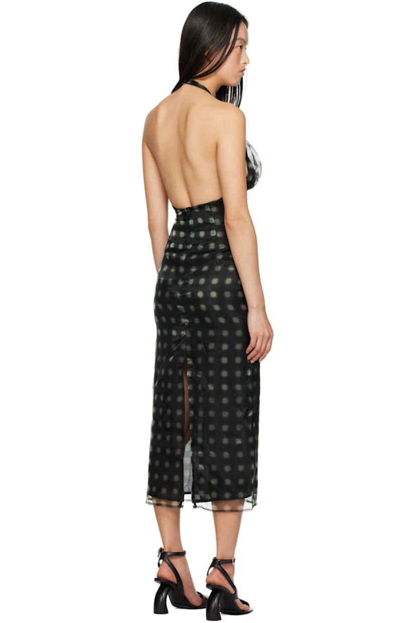 Semi-sheer polyester organza midi dress. Polka dot pattern printed throughout. 

· Round neck
· Gathering at chest
· Button fastening at halter strap
· Zip closure at open back
· Central vent at back hem
· Full georgette lining

Supplier color: Verde