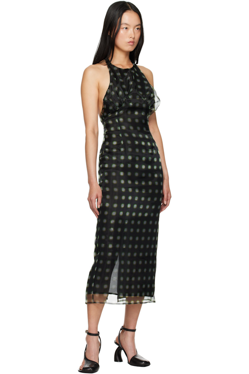 Semi-sheer polyester organza midi dress. Polka dot pattern printed throughout. 

· Round neck
· Gathering at chest
· Button fastening at halter strap
· Zip closure at open back
· Central vent at back hem
· Full georgette lining

Supplier color: Verde