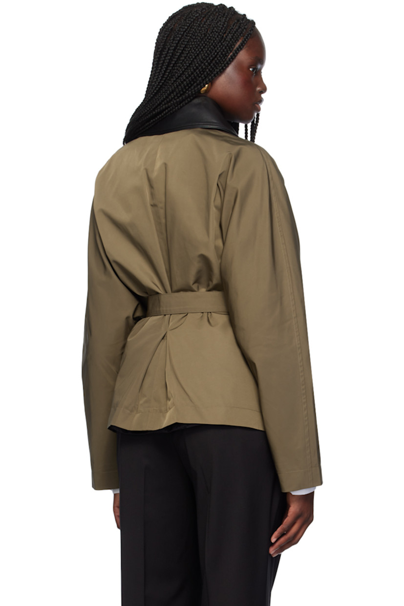 Loose-fit polyester taslan jacket. Grained leather trim throughout.

· Water-repellent
· Spread collar
· Zip closure
· Detachable self-tie belt at waist
· Seam pockets
· Dolman sleeves
· Inverted box pleats at back
· Full viscose tricot lining

Supplier color: Cachi