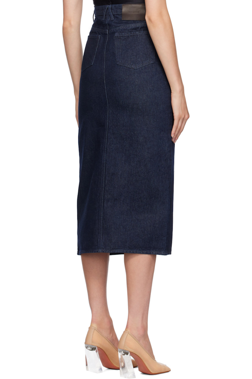 Non-stretch denim skirt. 

· Belt loops
· Five-pocket styling
· Zip-fly
· Slit at front hem
· Leather logo patch at back waistband
· Enameled hardware

Supplier color: Profondo