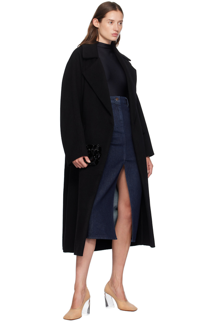 Non-stretch denim skirt. 

· Belt loops
· Five-pocket styling
· Zip-fly
· Slit at front hem
· Leather logo patch at back waistband
· Enameled hardware

Supplier color: Profondo
