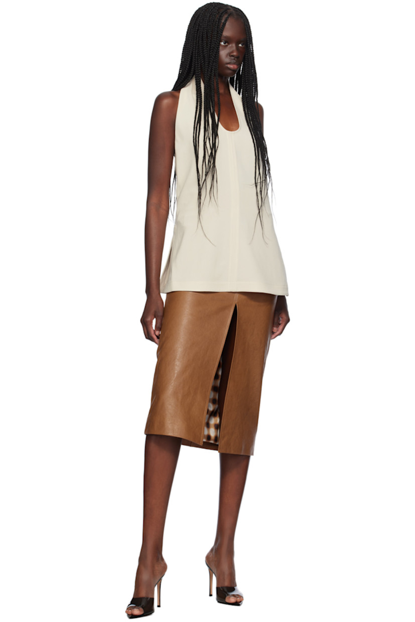 Grained leather skirt.

· Belt loops
· Five-pocket styling
· Zip-fly
· Central vent at front hem
· Full stretch twill lining

Supplier color: Cognac