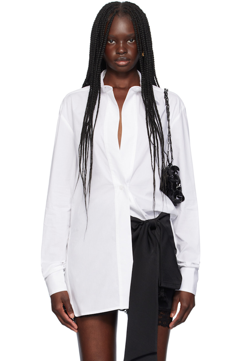 Cotton poplin shirt. 

· Spread collar
· Button closure
· Vented side seams
· Two-button barrel cuffs

Supplier color: Bianco