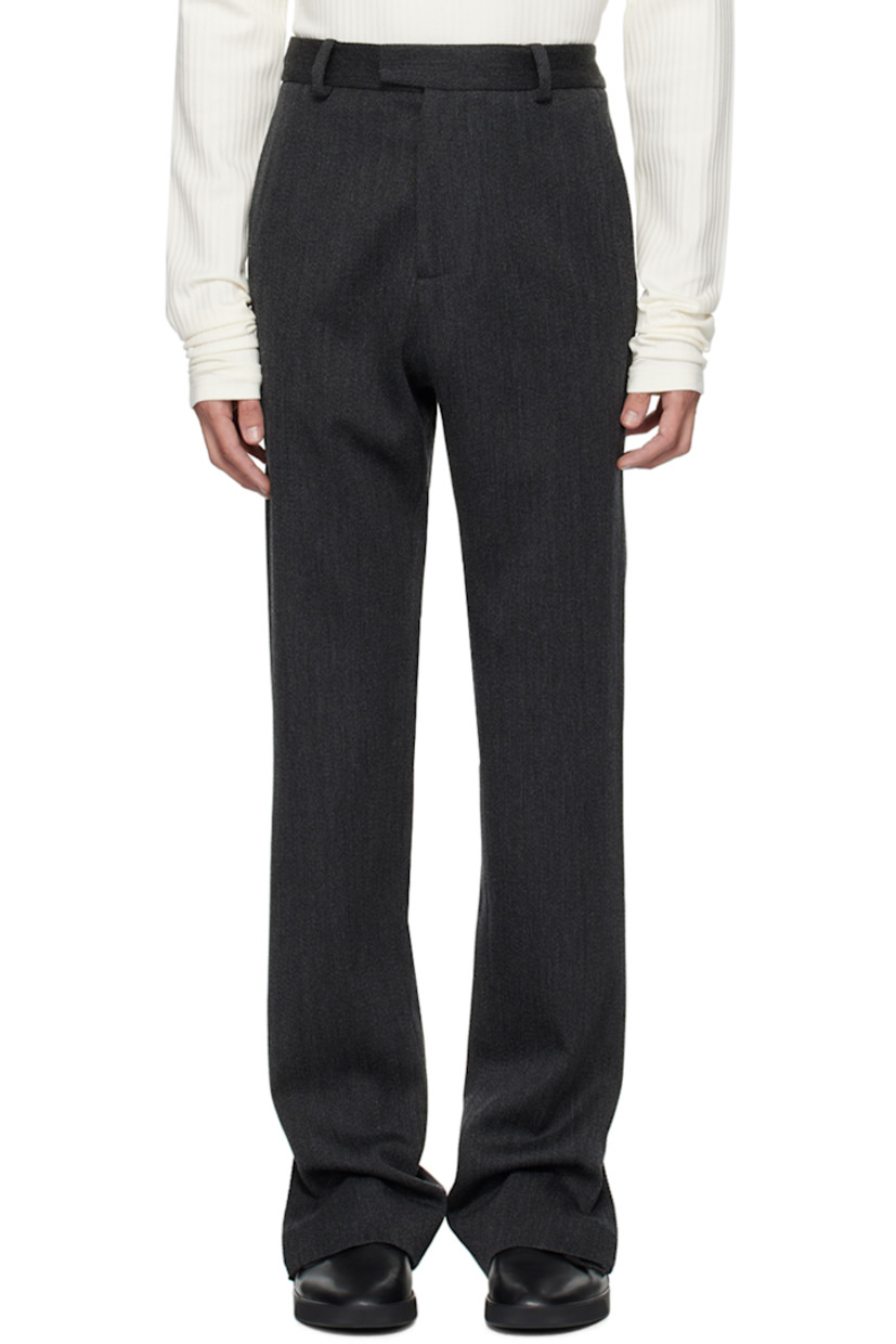 Polyester- and virgin wool-blend twill trousers.

· Belt loops
· Four-pocket styling
· Zip-fly
· Zip vent at cuffs

Supplier color: Grigio antracite