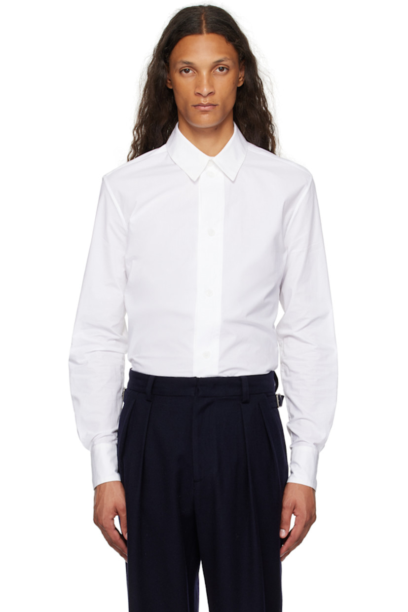 Cotton poplin shirt.

· Spread collar
· Button closure
· Shirttail hem
· Two-button barrel cuffs

Supplier color: Bianco