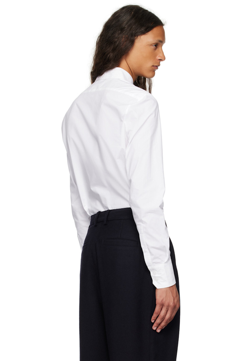 Cotton poplin shirt.

· Spread collar
· Button closure
· Shirttail hem
· Two-button barrel cuffs

Supplier color: Bianco