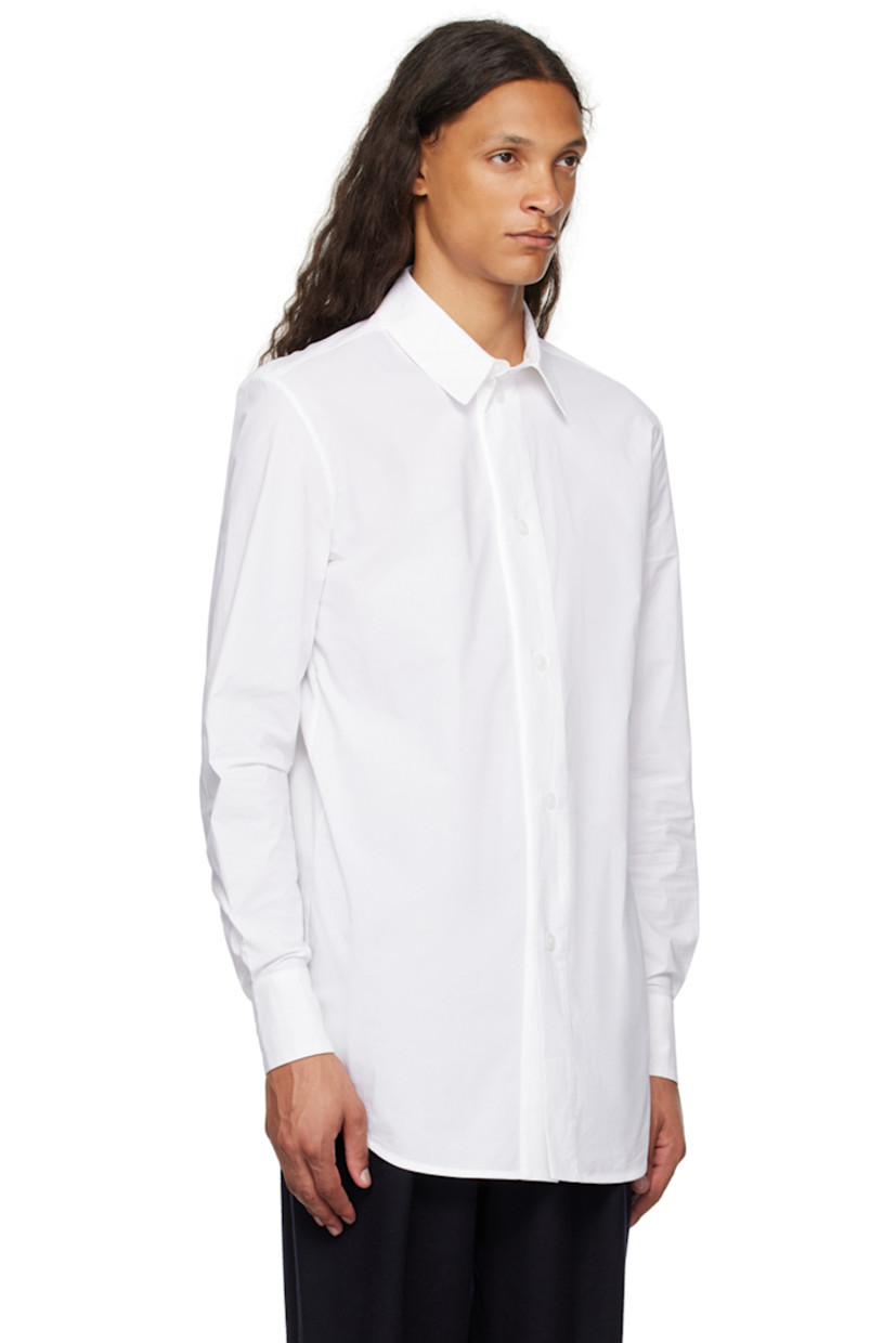 Cotton poplin shirt.

· Spread collar
· Button closure
· Shirttail hem
· Two-button barrel cuffs

Supplier color: Bianco