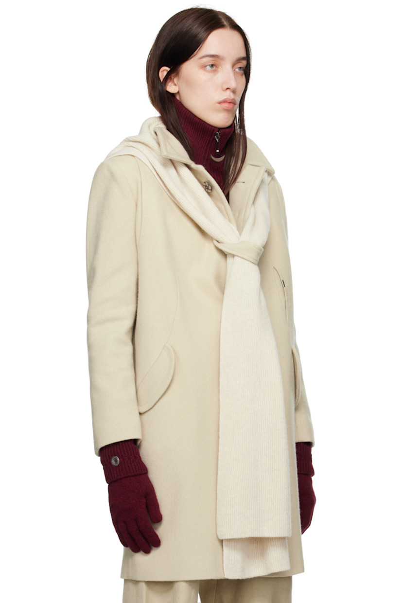 Wool-blend melton coat. 

· Paneled construction
· Scarf-style trim at detachable rib-knit hood
· Spread collar 
· Graphic ceramic hardware at concealed button closure 
· Logo plaque and keeper loop at front
· Patch pocket and flap pockets
· Concealed zip pocket at armscye
· Central vent at back hem
· Partial satin lining

Supplier color: Ivory