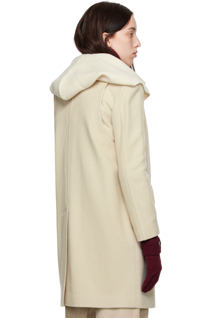 Wool-blend melton coat. 

· Paneled construction
· Scarf-style trim at detachable rib-knit hood
· Spread collar 
· Graphic ceramic hardware at concealed button closure 
· Logo plaque and keeper loop at front
· Patch pocket and flap pockets
· Concealed zip pocket at armscye
· Central vent at back hem
· Partial satin lining

Supplier color: Ivory