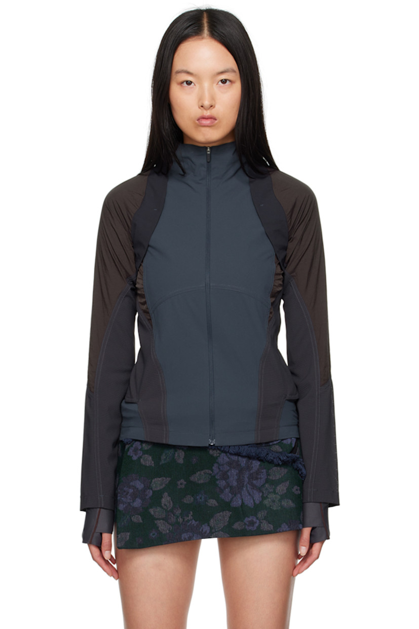 Nylon taffeta and mesh jacket. 

· Paneled construction
· Mock neck
· Zip closure

Supplier color: Midnight