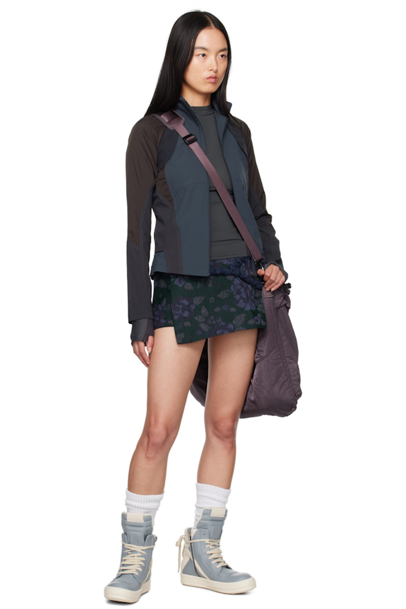 Nylon taffeta and mesh jacket. 

· Paneled construction
· Mock neck
· Zip closure

Supplier color: Midnight