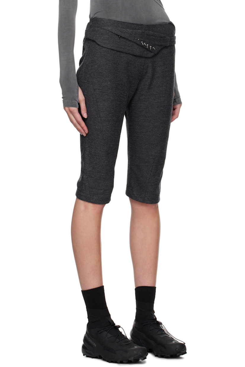 Cotton- and wool-blend twill trousers. Darts throughout. 

· Graphic charms at detachable zip pouch 
· Two-pocket styling 
· Cropped legs
· Zip closure at outseam 
· Twisted outseams 
· Belt loop at back waist 
· Zip pocket at back 

Supplier color: Grey