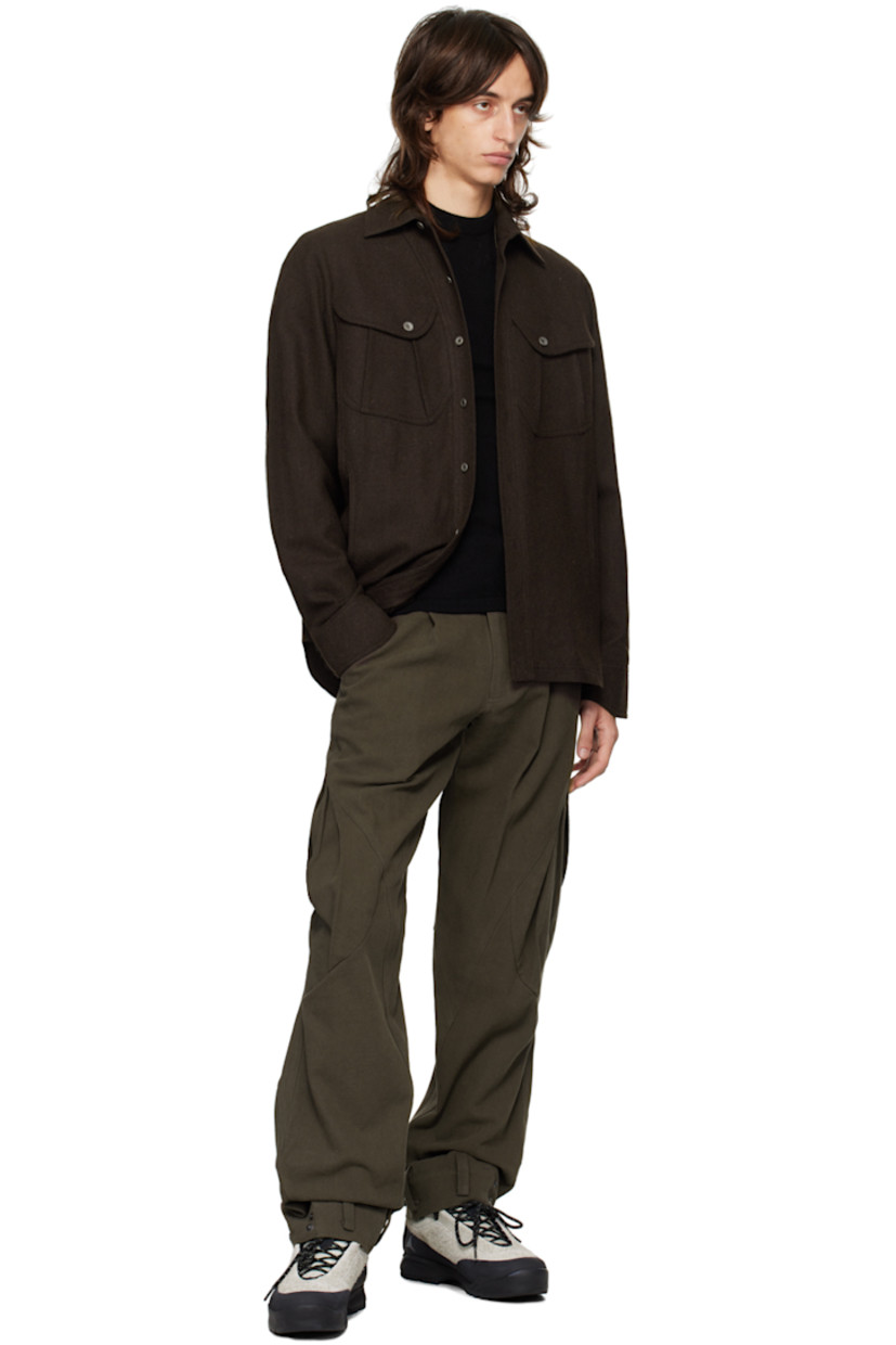 Wool-blend flannel shirt. 

· Spread collar
· Button closure
· Flap and seam pockets
· Adjustable single-button barrel cuffs

Supplier color: Brown
