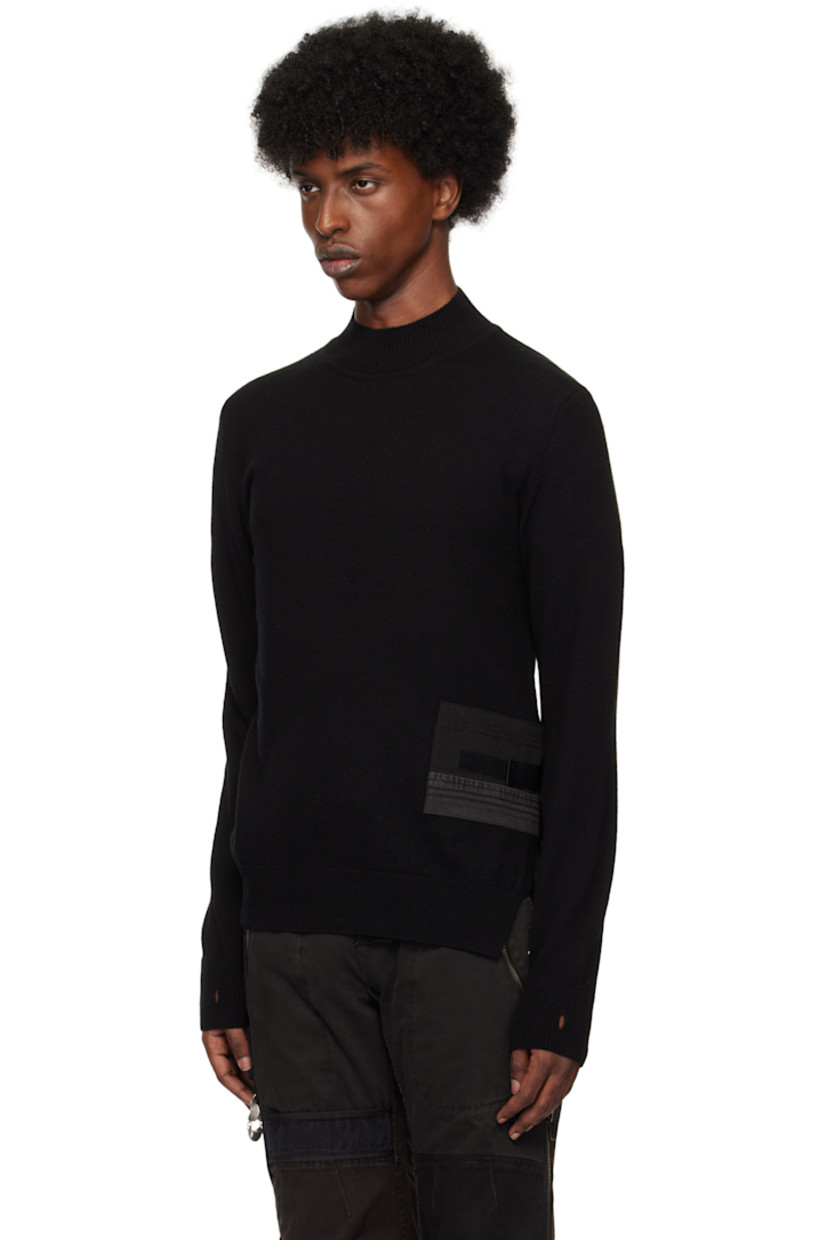 Knit extra fine wool turtleneck.

· Rib knit collar, hem, and cuffs
· Cotton twill trim at front and back
· Velcro tab at vented side seam
· Thumbhole at cuffs

Pair of knit extra fine wool gloves in black.

· Button hardware at rib knit cuffs
· Logo flag at cuffs

Supplier color: Black